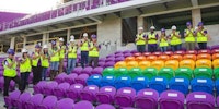 Orlando city soccer unveils 49 Rainbow-colored seats at its new stadium to honour the victims of the June shooting at pulse nightclub.